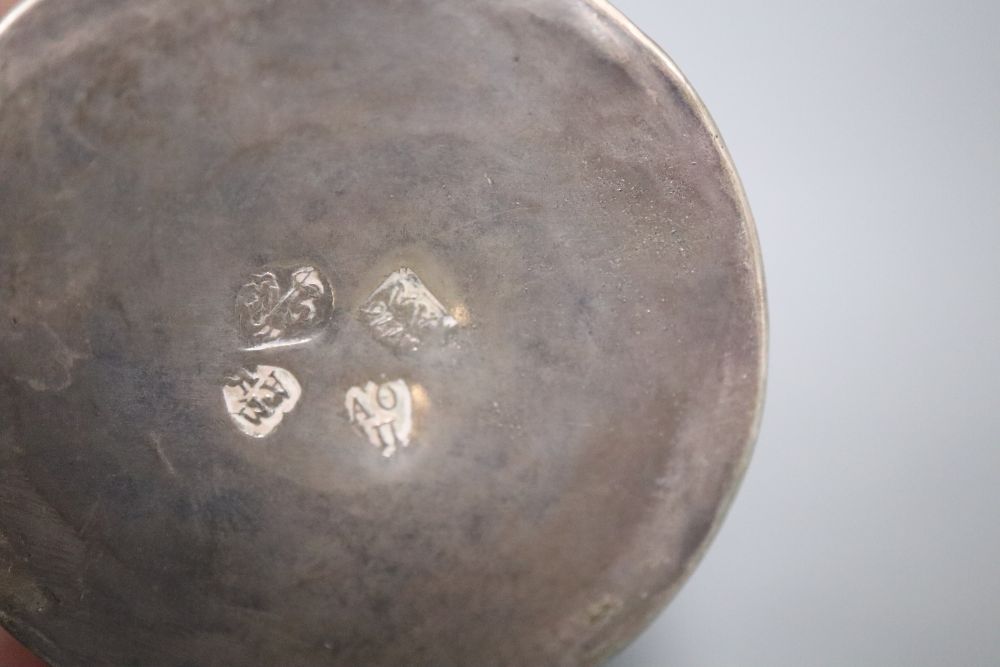 An 18th century Russian embossed white metal beaker, dated 1776, with later inscription, 75mm, 71.9 grams.